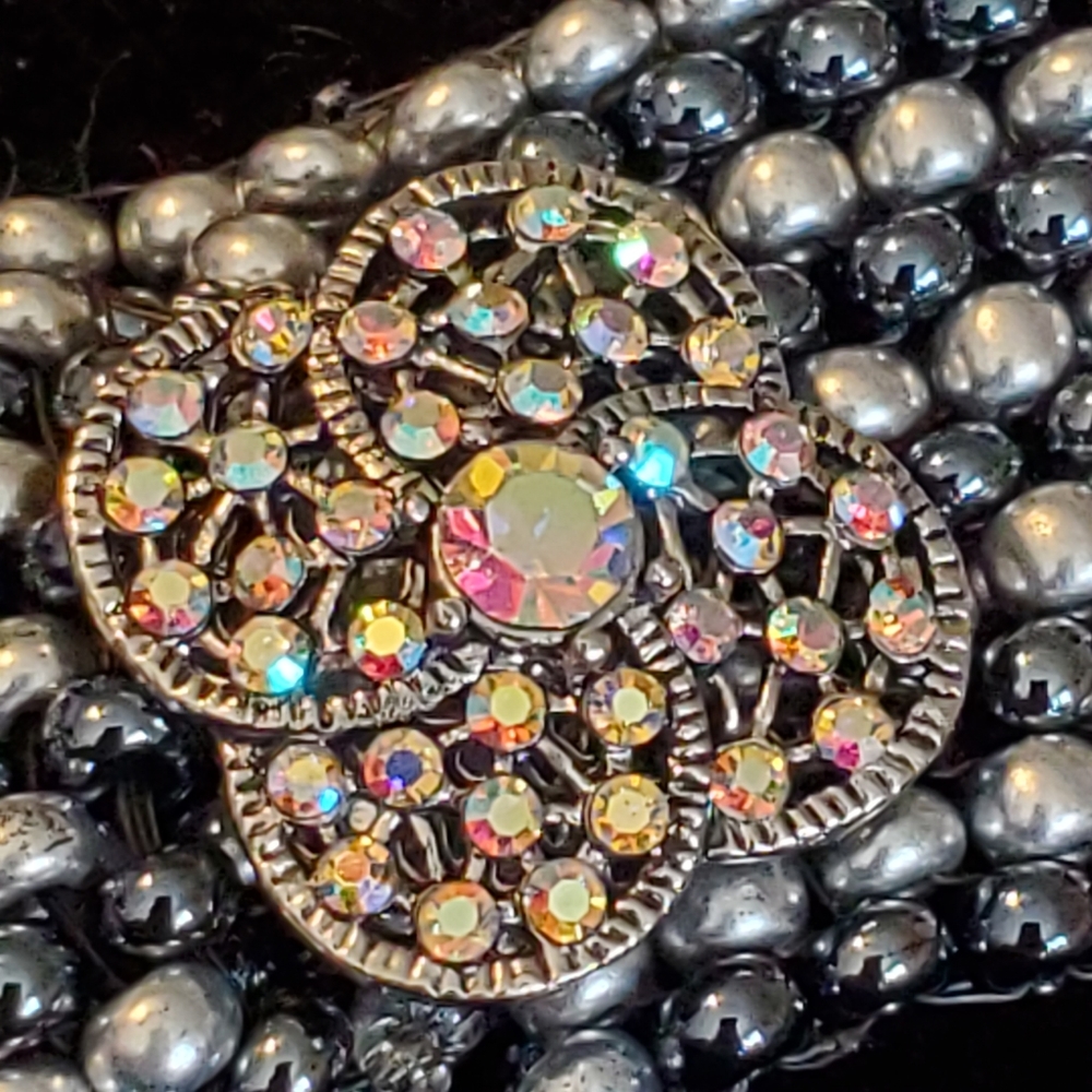 Vintage look beaded bracelet with aurora borealis flower clasp